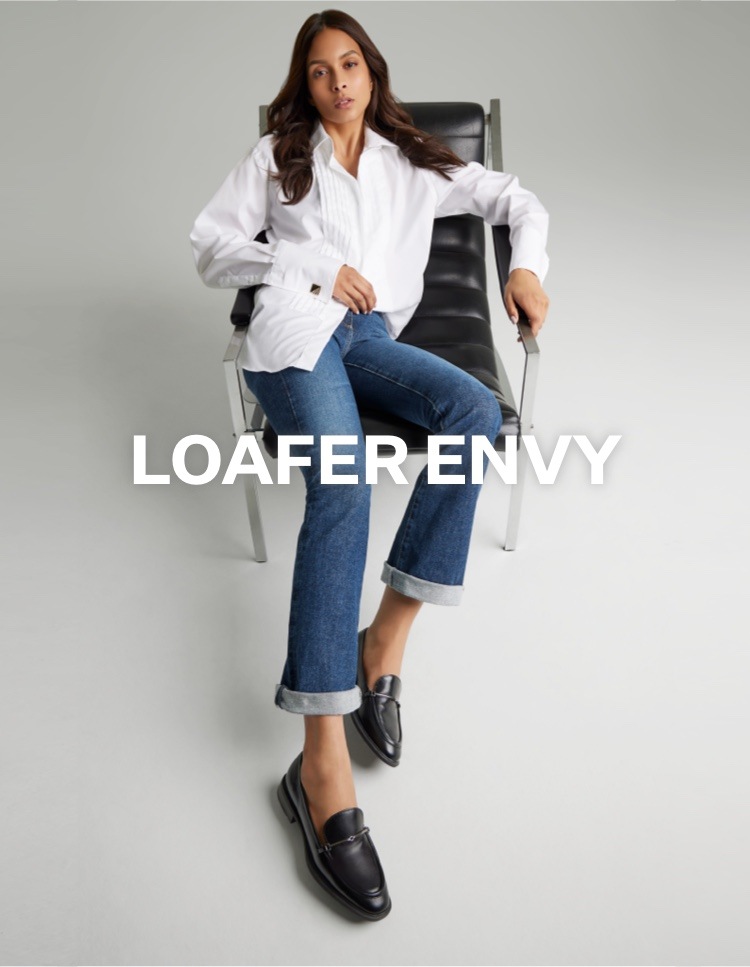 model wearing the Sarto Eda loafer in black leather