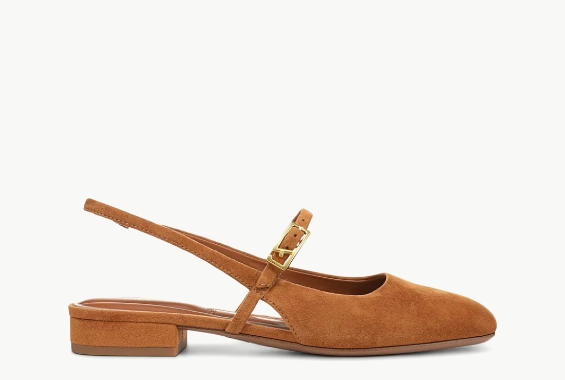 Side view of a women’s slingback flat in brown suede.   